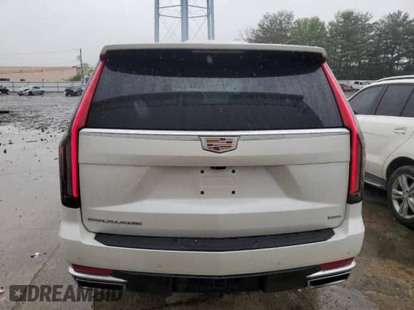 2022 Cadillac Escalade Premium Luxury с VIN 1GYS4BKL3NR164999, выставлен на аукционе Copart как лот 58035295 с пробегом 42 871 миль миль и Списание • Salvage title. История ставок и продаж доступна на DreamBid. Изображение 6.