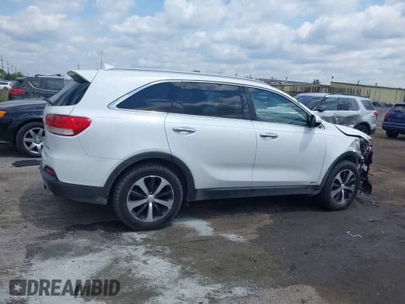 2016 Kia Sorento EX z VIN 5XYPHDA10GG016872, wystawiony jako IAAI lot #42479799 z przebiegiem 153 553 mil mil oraz . Historia ofert i sprzedaży dostępna na DreamBid. Obrazek 13.