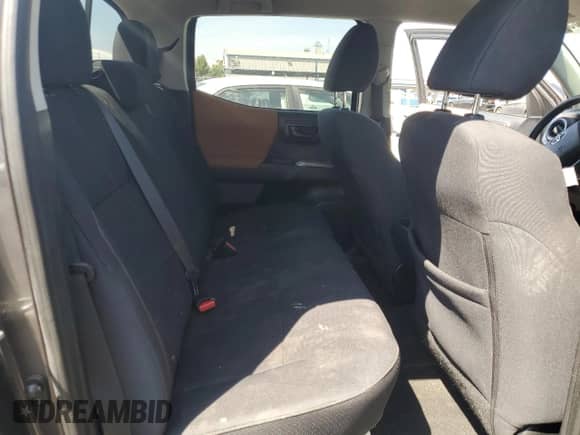 2018 Toyota Tacoma SR5 z VIN 3TMAZ5CN0JM059076, wystawiony jako Copart lot #71305965 z przebiegiem 80 502 mil mil oraz Szkoda całkowita • Salvage title. Historia ofert i sprzedaży dostępna na DreamBid. Obrazek 10.