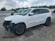 2015 Jeep Grand Cherokee Overland z VIN 1C4RJFCG1FC111129, wystawiony jako Copart lot #68217055 z przebiegiem 119 318 mil mil oraz Szkoda całkowita • Salvage title. Historia ofert i sprzedaży dostępna na DreamBid. Obrazek 1.