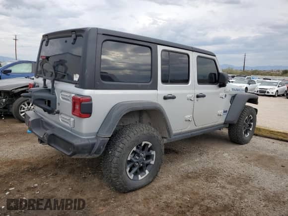 2024 Jeep Wrangler Rubicon z VIN 1C4RJXR69RW255776, wystawiony jako Copart lot #81444315 z przebiegiem 11 461 mil mil oraz Szkoda całkowita • Salvage title. Historia ofert i sprzedaży dostępna na DreamBid. Obrazek 3.