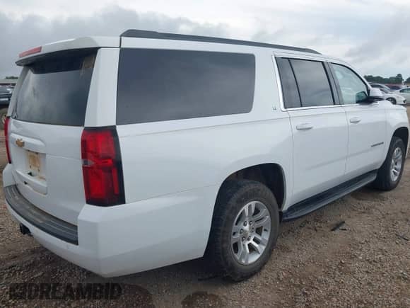 2019 Chevrolet Suburban LT z VIN 1GNSCHKC2KR141759, wystawiony jako IAAI lot #42743049 z przebiegiem 159 914 mil mil oraz . Historia ofert i sprzedaży dostępna na DreamBid. Obrazek 4.