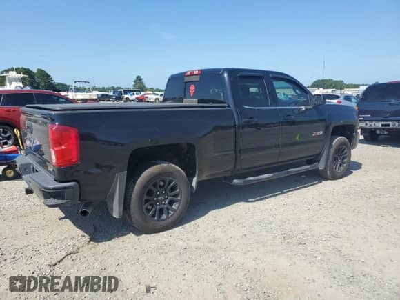 2017 Chevrolet Silverado 1500 LTZ with VIN 1GCVKSEC2HZ131078, listed as a Copart auction lot 61771675 with 92,478 mi miles and Salvage title. Bid and sale history available at DreamBid. Image 3.