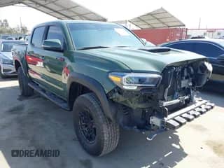2020 Toyota Tacoma SR5 with VIN 5TFCZ5AN1LX225856, listed as a IAAI auction lot 42555606 with 71,860 mi miles and . Bid and sale history available at DreamBid. Image 1.