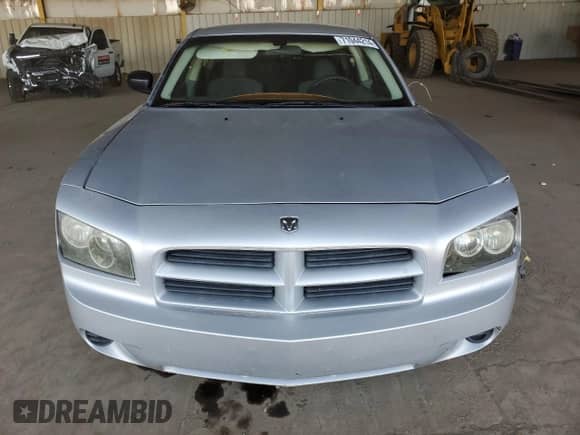 2009 Dodge Charger SE with VIN 2B3KA43D39H505990, listed as a Copart auction lot 71044214 with 223,573 mi miles and Salvage title. Bid and sale history available at DreamBid. Image 5.