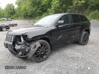 2019 Jeep Grand Cherokee Laredo E with VIN 1C4RJFAG3KC629143, listed as a Copart auction lot 61034645 with 98,539 mi miles and Salvage title. Bid and sale history available at DreamBid. Image 1.