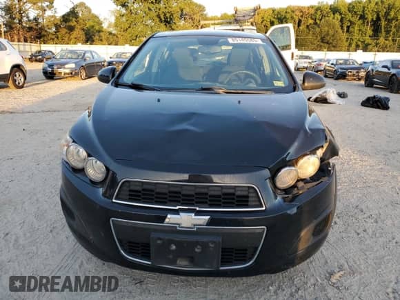 2012 Chevrolet Sonic LT z VIN 1G1JC6SH5C4140536, wystawiony jako Copart lot #85145585 z przebiegiem 93 734 mil mil oraz Szkoda całkowita • Salvage title. Historia ofert i sprzedaży dostępna na DreamBid. Obrazek 5.