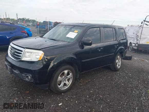 2014 Honda Pilot EX-L with VIN 5FNYF3H51EB001931, listed as a IAAI auction lot 42634856 with 211,271 mi miles and . Bid and sale history available at DreamBid. Image 23.