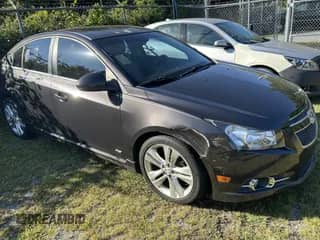 2014 Chevrolet Cruze LTZ with VIN 1G1PG5SB4E7332200, listed as a IAAI auction lot 43201338 with 151,318 mi miles and . Bid and sale history available at DreamBid. Image 1.