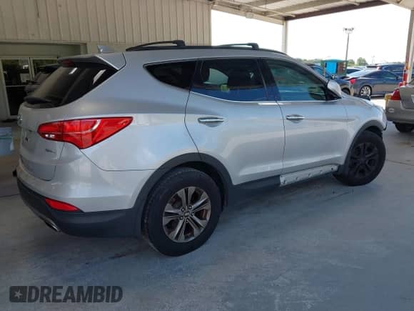 2014 Hyundai Santa Fe с VIN 5XYZU3LB1EG186577, выставлен на аукционе IAAI как лот 43011637 с пробегом 188 209 миль миль и . История ставок и продаж доступна на DreamBid. Изображение 4.