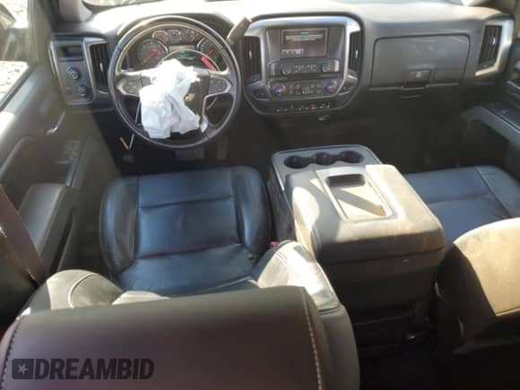 2017 Chevrolet Silverado 1500 LT z VIN 3GCUKREC6HG124686, wystawiony jako Copart lot #82100375 z przebiegiem 117 074 mil mil oraz Nie do naprawy • Non repairable. Historia ofert i sprzedaży dostępna na DreamBid. Obrazek 8.