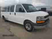 2014 Chevrolet Express Passenger LT with VIN 1GAZG1FGXE1157798, listed as a Copart auction lot 64301595 with 272,982 mi miles and Clean title. Bid and sale history available at DreamBid. Image 4.