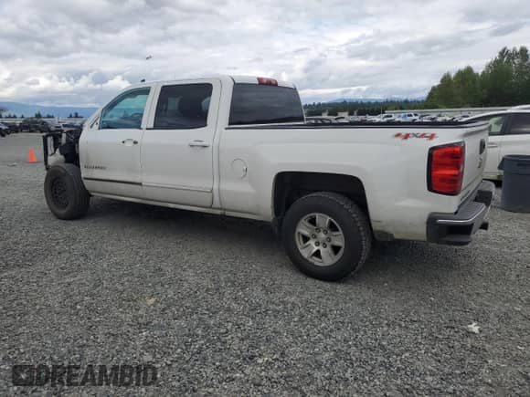 2015 Chevrolet Silverado 1500 LT with VIN 1GCUKREC6FF197796, listed as a Copart auction lot 58971125 with 115,248 mi miles and Salvage title. Bid and sale history available at DreamBid. Image 2.