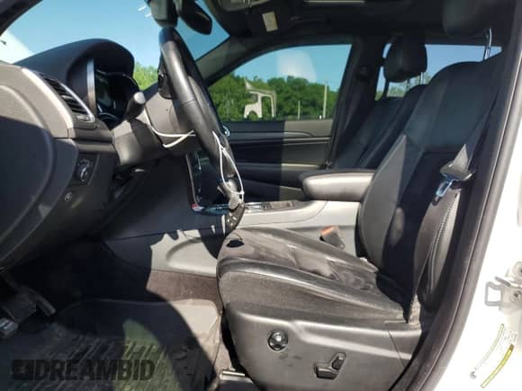 2018 Jeep Grand Cherokee Laredo with VIN 1C4RJFAG2JC117744, listed as a Copart auction lot 60881105 with 109,601 mi miles and Salvage title. Bid and sale history available at DreamBid. Image 7.