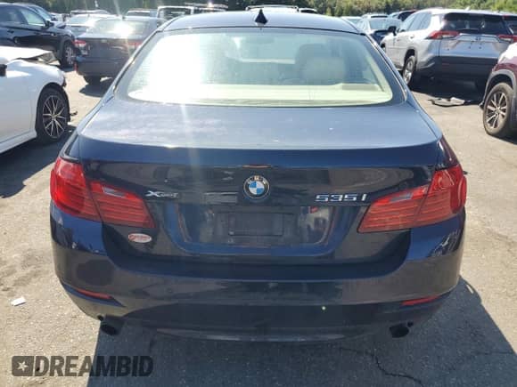 2014 BMW 5 Series 535i xDrive with VIN WBA5B3C54ED533801, listed as a Copart auction lot 71717725 with Not provided miles and Salvage title. Bid and sale history available at DreamBid. Image 6.