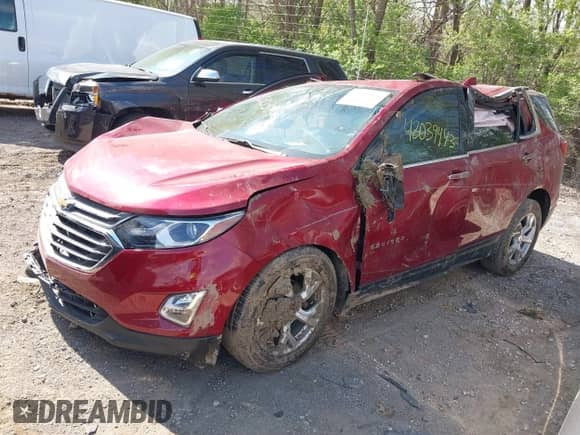 2021 Chevrolet Equinox Premier with VIN 2GNAXNEV7M6140889, listed as a IAAI auction lot 42039443 with 101,767 mi miles and . Bid and sale history available at DreamBid. Image 2.