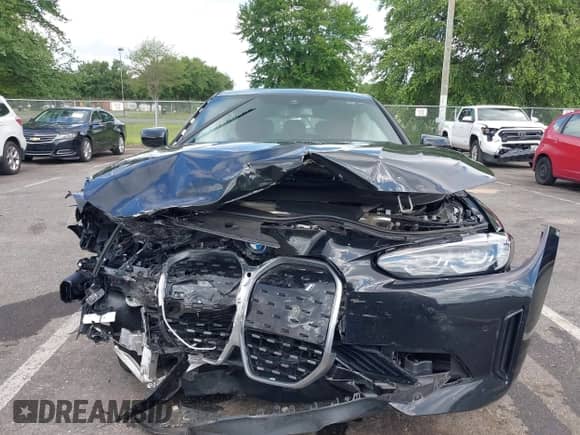 2024 BMW i4 xDrive40 with VIN WBY83FB03RFT31075, listed as a IAAI auction lot 42743691 with 14,883 mi miles and . Bid and sale history available at DreamBid. Image 12.