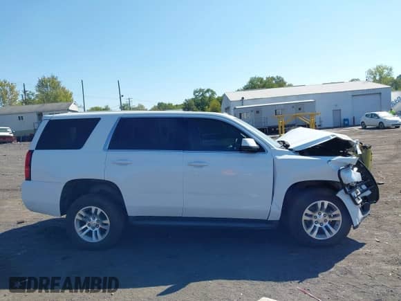 2017 Chevrolet Tahoe Commercial with VIN 1GNSKFEC9HR214265, listed as a IAAI auction lot 43234483 with 173,235 mi miles and . Bid and sale history available at DreamBid. Image 13.