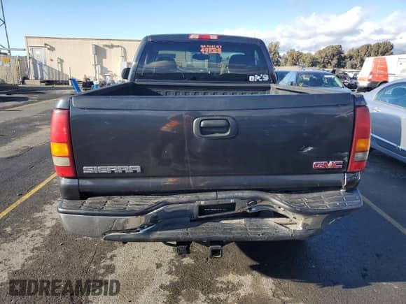 2003 GMC Sierra 1500 SLE z VIN 1GTEK14V23Z254997, wystawiony jako Copart lot #80293904 z przebiegiem 242 384 mil mil oraz Szkoda całkowita • Salvage title. Historia ofert i sprzedaży dostępna na DreamBid. Obrazek 6.