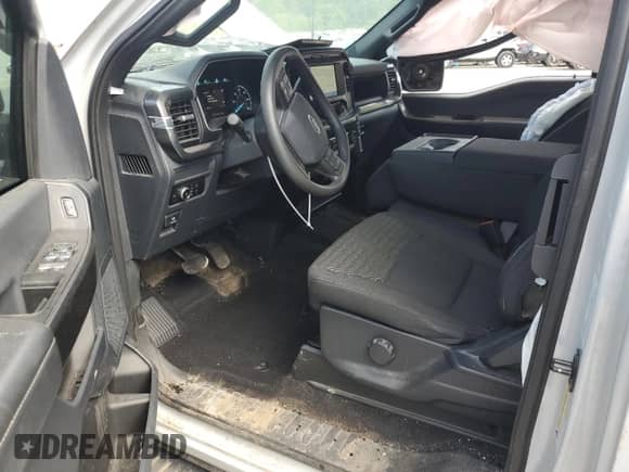 2023 Ford F-150 XL with VIN 1FTFX1E53PKE07695, listed as a Copart auction lot 70125775 with 25,247 mi miles and Salvage title. Bid and sale history available at DreamBid. Image 8.