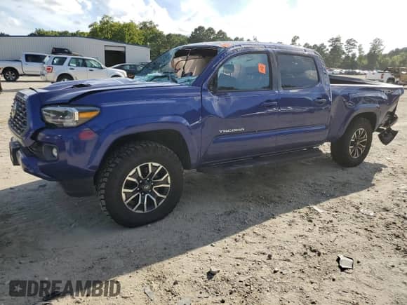 2022 Toyota Tacoma SR5 with VIN 3TYDZ5BN0NT005849, listed as a Copart auction lot 71113125 with 63,449 mi miles and Salvage title. Bid and sale history available at DreamBid. Image 1.