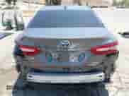 2020 Toyota Camry Hybrid XLE with VIN 4T1F31AK0LU527228, listed as a IAAI auction lot 42532828 with 99,749 mi miles and . Bid and sale history available at DreamBid. Image 17.