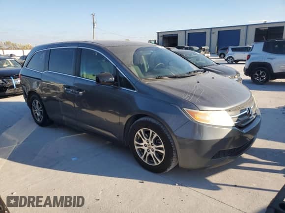 2012 Honda Odyssey EX z VIN 5FNRL5H41CB120012, wystawiony jako Copart lot #87036855 z przebiegiem 120 980 mil mil oraz Szkoda całkowita • Salvage title. Historia ofert i sprzedaży dostępna na DreamBid. Obrazek 4.