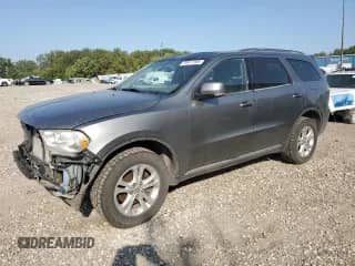 2012 Dodge Durango Crew with VIN 1C4RDJDG9CC126837, listed as a Copart auction lot 70917295 with 179,645 mi miles and Salvage title. Bid and sale history available at DreamBid. Image 1.
