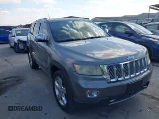 2012 Jeep Grand Cherokee Overland z VIN 1C4RJECT6CC311572, wystawiony jako IAAI lot #43343686 z przebiegiem 163 181 mil mil oraz . Historia ofert i sprzedaży dostępna na DreamBid. Obrazek 1.