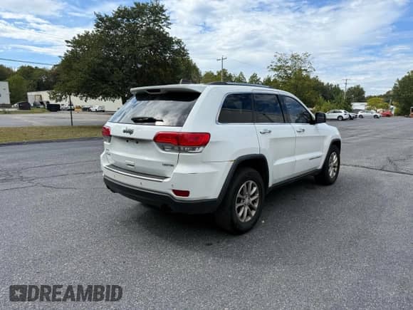 2014 Jeep Grand Cherokee Limited z VIN 1C4RJFBG9EC232250, wystawiony jako Copart lot #83767935 z przebiegiem 264 598 mil mil oraz Czysty tytuł • Clean title. Historia ofert i sprzedaży dostępna na DreamBid. Obrazek 4.