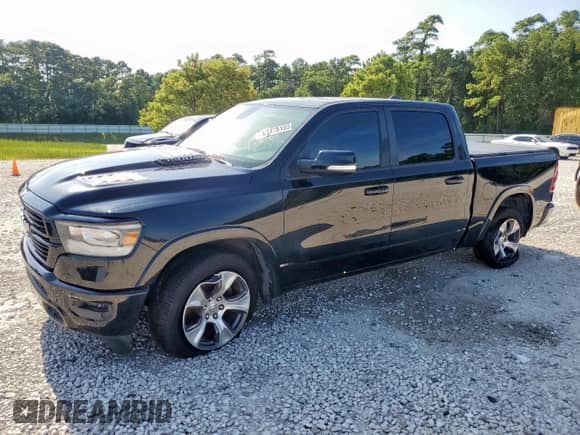 2019 Ram 1500 Laramie with VIN 1C6RREJT3KN884760, listed as a Copart auction lot 67175155 with 100,841 mi miles and Salvage title. Bid and sale history available at DreamBid. Image 1.