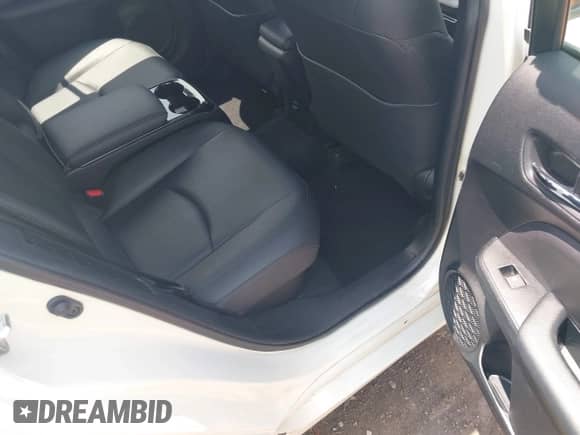 2018 Toyota Prius Plus z VIN JTDKARFP5J3070415, wystawiony jako IAAI lot #42701325 z przebiegiem 77 529 mil mil oraz . Historia ofert i sprzedaży dostępna na DreamBid. Obrazek 8.