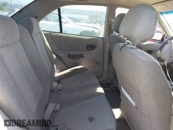 2002 Hyundai Accent GL z VIN KMHCG45C42U375352, wystawiony jako IAAI lot #42699297 z przebiegiem 103 540 mil mil oraz . Historia ofert i sprzedaży dostępna na DreamBid. Obrazek 8.