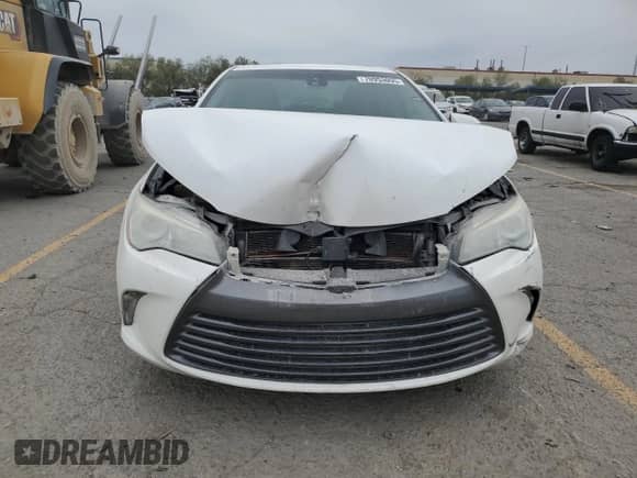 2015 Toyota Camry LE с VIN 4T1BD1FKXFU167796, выставлен на аукционе Copart как лот 70953095 с пробегом 128 819 миль миль и Списание • Salvage title. История ставок и продаж доступна на DreamBid. Изображение 5.