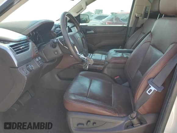 2015 Chevrolet Tahoe LTZ with VIN 1GNSCCKC9FR706761, listed as a Copart auction lot 86709605 with 181,421 mi miles and Salvage title. Bid and sale history available at DreamBid. Image 7.