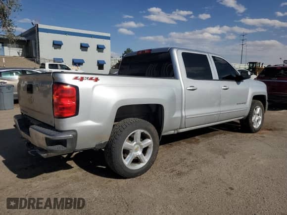 2018 Chevrolet Silverado 1500 LT with VIN 3GCUKREH8JG334594, listed as a Copart auction lot 56954305 with 138,343 mi miles and Salvage title. Bid and sale history available at DreamBid. Image 3.
