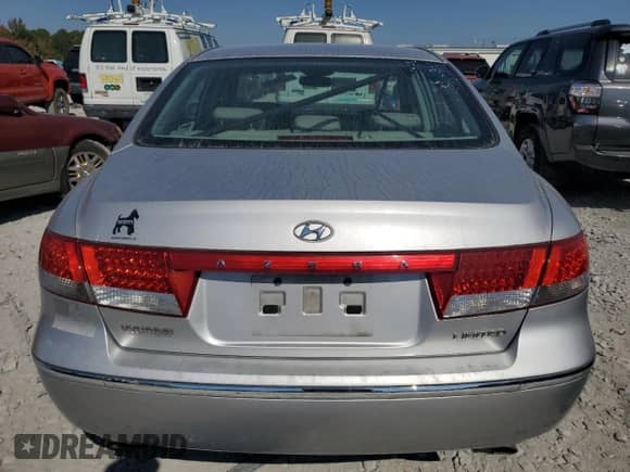 2006 Hyundai Azera SE с VIN KMHFC46F16A048898, выставлен на аукционе Copart как лот 77953824 с пробегом 110 623 миль миль и Списание • Salvage title. История ставок и продаж доступна на DreamBid. Изображение 6.