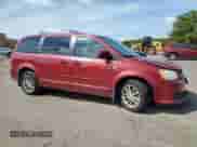 2014 Dodge Grand Caravan SXT 30th Anniversary with VIN 2C4RDGCGXER459093, listed as a Copart auction lot 80838535 with 128,561 mi miles and Salvage title. Bid and sale history available at DreamBid. Image 4.