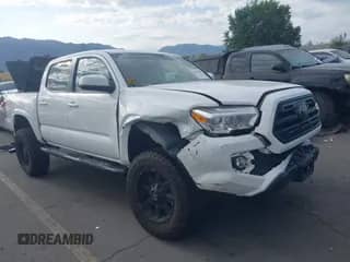 2019 Toyota Tacoma SR with VIN 3TMCZ5AN9KM258303, listed as a IAAI auction lot 42817459 with 69,916 mi miles and . Bid and sale history available at DreamBid. Image 1.