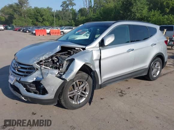2017 Hyundai Santa Fe 2.4L with VIN 5XYZUDLB6HG491163, listed as a IAAI auction lot 42729584 with 91,606 mi miles and . Bid and sale history available at DreamBid. Image 2.