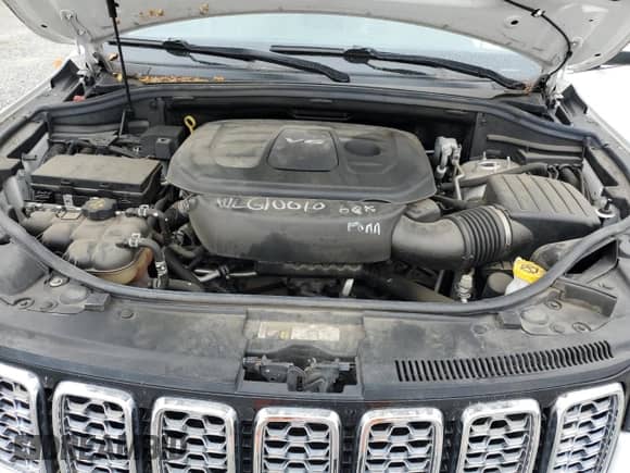 2017 Jeep Grand Cherokee Overland with VIN 1C4RJECG6HC965661, listed as a Copart auction lot 65547715 with 76,441 mi miles and Salvage title. Bid and sale history available at DreamBid. Image 12.