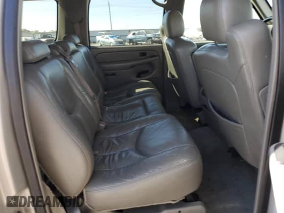 2004 Chevrolet Suburban LT z VIN 1GNFK16Z94J156657, wystawiony jako Copart lot #74087664 z przebiegiem 267 416 mil mil oraz Szkoda całkowita • Salvage title. Historia ofert i sprzedaży dostępna na DreamBid. Obrazek 11.