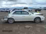 2005 Hyundai XG z VIN KMHFU45E85A418734, wystawiony jako IAAI lot #42312182 z przebiegiem 211 464 mil mil oraz . Historia ofert i sprzedaży dostępna na DreamBid. Obrazek 13.