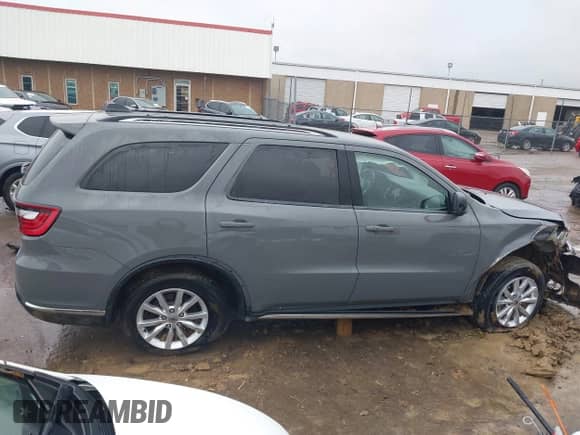 2023 Dodge Durango SXT with VIN 1C4RDHAG9PC569511, listed as a IAAI auction lot 41952170 with 55,653 mi miles and . Bid and sale history available at DreamBid. Image 13.