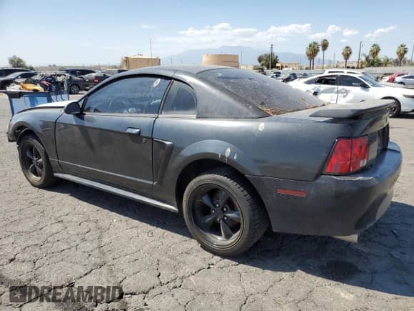 2003 Ford Mustang Standard z VIN 1FAFP40413F380800, wystawiony jako Copart lot #71020715 z przebiegiem 121 705 mil mil oraz Nie do naprawy • Non repairable. Historia ofert i sprzedaży dostępna na DreamBid. Obrazek 2.