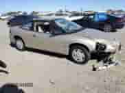 1996 Saturn SC z VIN 1G8ZF1285TZ345887, wystawiony jako Copart lot #49314345 z przebiegiem 48 622 mil mil oraz Szkoda całkowita • Salvage title. Historia ofert i sprzedaży dostępna na DreamBid. Obrazek 4.