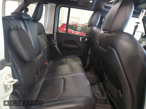 2024 Jeep Wrangler Rubicon with VIN 1C4RJXR66RW100859, listed as a Copart auction lot 58377805 with 9,426 mi miles and Salvage title. Bid and sale history available at DreamBid. Image 11.