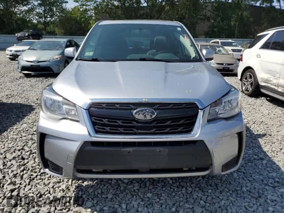 2018 Subaru Forester Premium with VIN JF2SJGECXJH411587, listed as a Copart auction lot 68100385 with 99,274 mi miles and Salvage title. Bid and sale history available at DreamBid. Image 5.