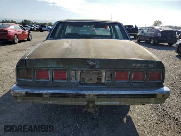 1985 Chevrolet Caprice с VIN 1G1BN69HXFX143536, выставлен на аукционе Copart как лот 71765324 с пробегом 14 242 миль миль и Чистый • Clean title. История ставок и продаж доступна на DreamBid. Изображение 6.