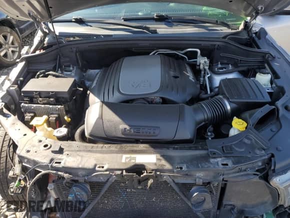 2014 Dodge Durango R/T with VIN 1C4SDJCT3EC451437, listed as a Copart auction lot 70326495 with 146,415 mi miles and Salvage title. Bid and sale history available at DreamBid. Image 12.